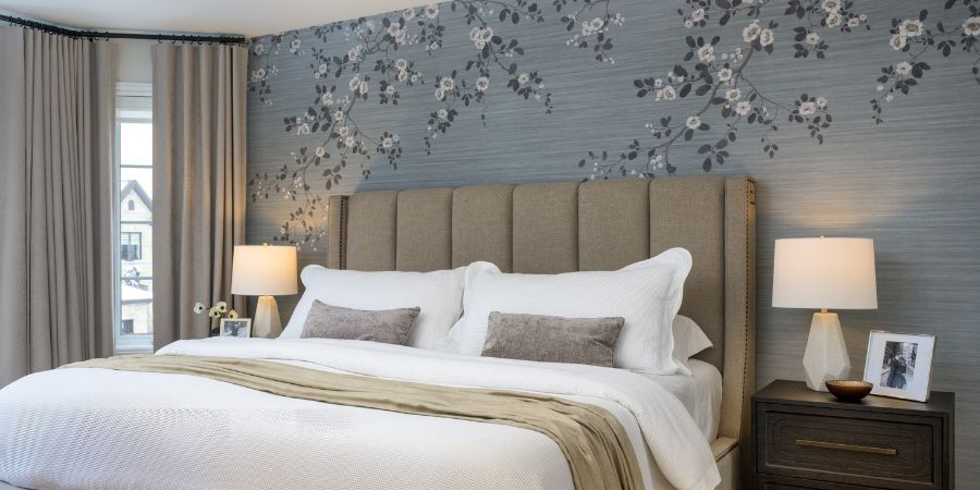 Elegant bedroom design featuring floral wallpaper and neutral tones, shown in interior design student portfolio examples to demonstrate professional styling skills.