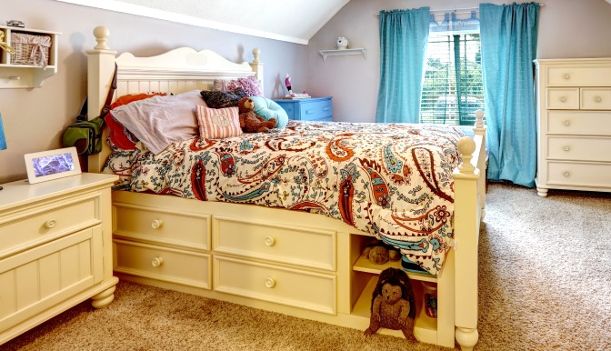 Child's bed with drawers for storage