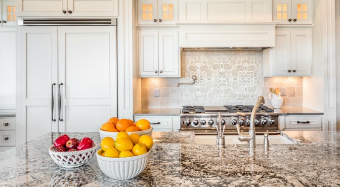 Bowls of fresh fruit and clean kitchen for professional home staging