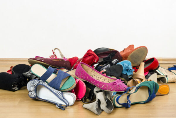 decluttering client's home - pile of mismatched shoes