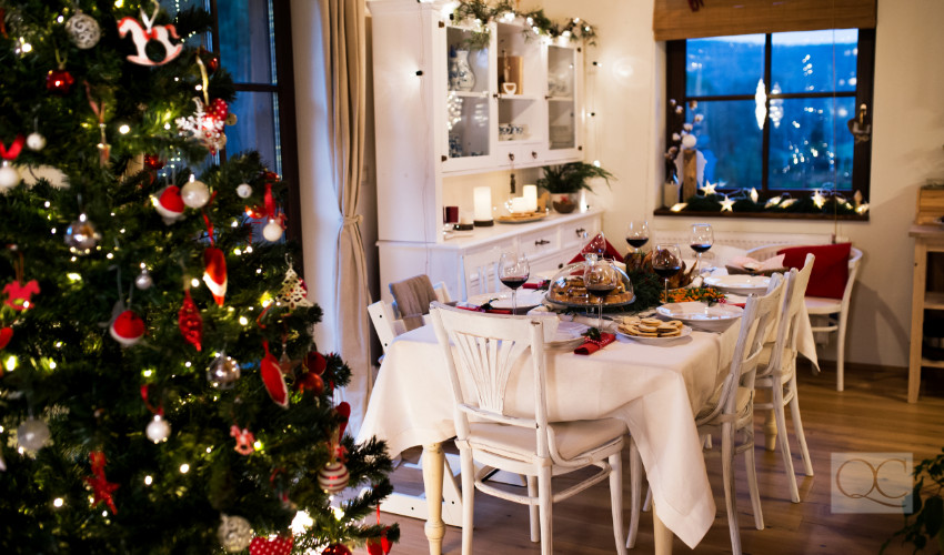 christmas holiday dinner dining room table display with christmas lights