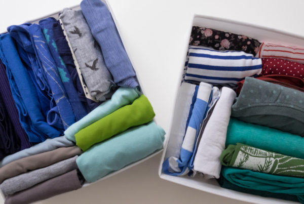 professionally organized clothing dividers for folded laundry