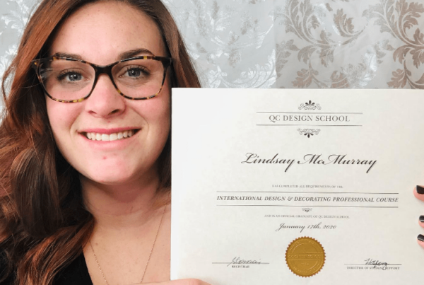 QC Design School Student Ambassador, Lindsay McMurray, holding her certification