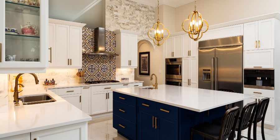 Beautiful luxury home kitchen with white cabinets. Charge home stager article.