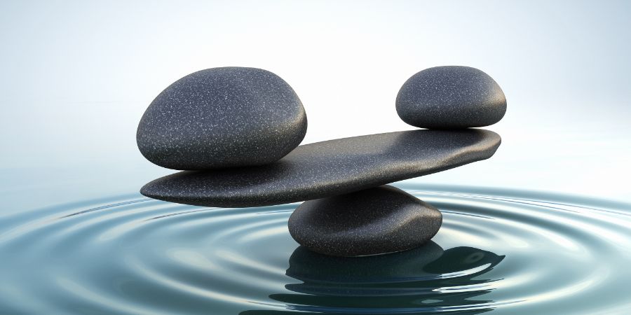 Zen stones balance. Sunrise. Feng Shui article.